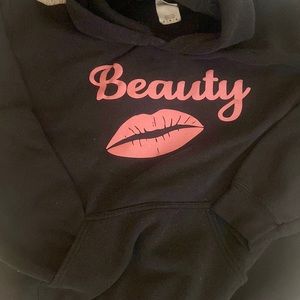 Customized “Beauty” hoodie. Size medium.